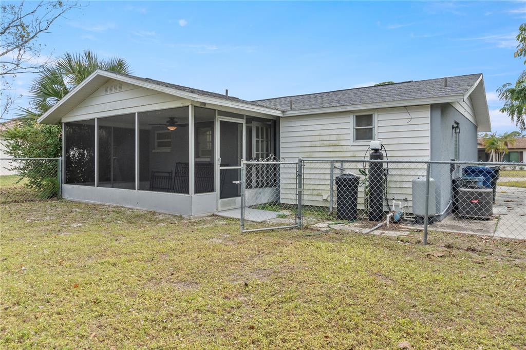 340 Periwinkle Road Venice, FL 34293 - Photo 24 of 36 a house with yard in front of it
