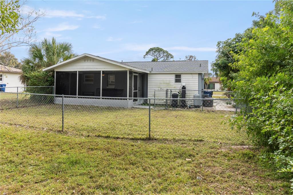 340 Periwinkle Road Venice, FL 34293 - Photo 26 of 36 a view of a house with a yard