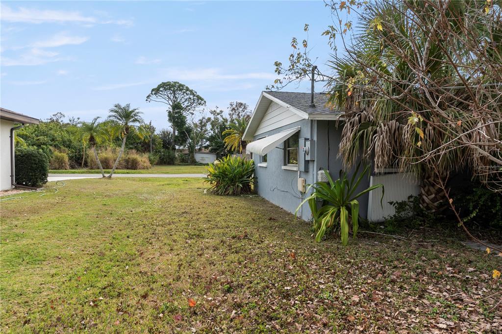 340 Periwinkle Road Venice, FL 34293 - Photo 29 of 36 a front view of a house with a yard