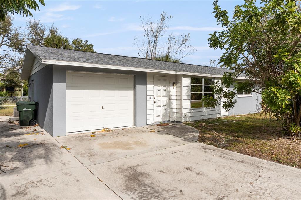 340 Periwinkle Road Venice, FL 34293 - Photo 8 of 36 a view of a house with a outdoor space