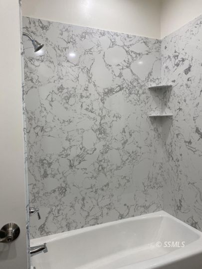 420 Thomas Street Ridgecrest, CA 93555 - Photo 6 of 13 a bathroom with a bathtub