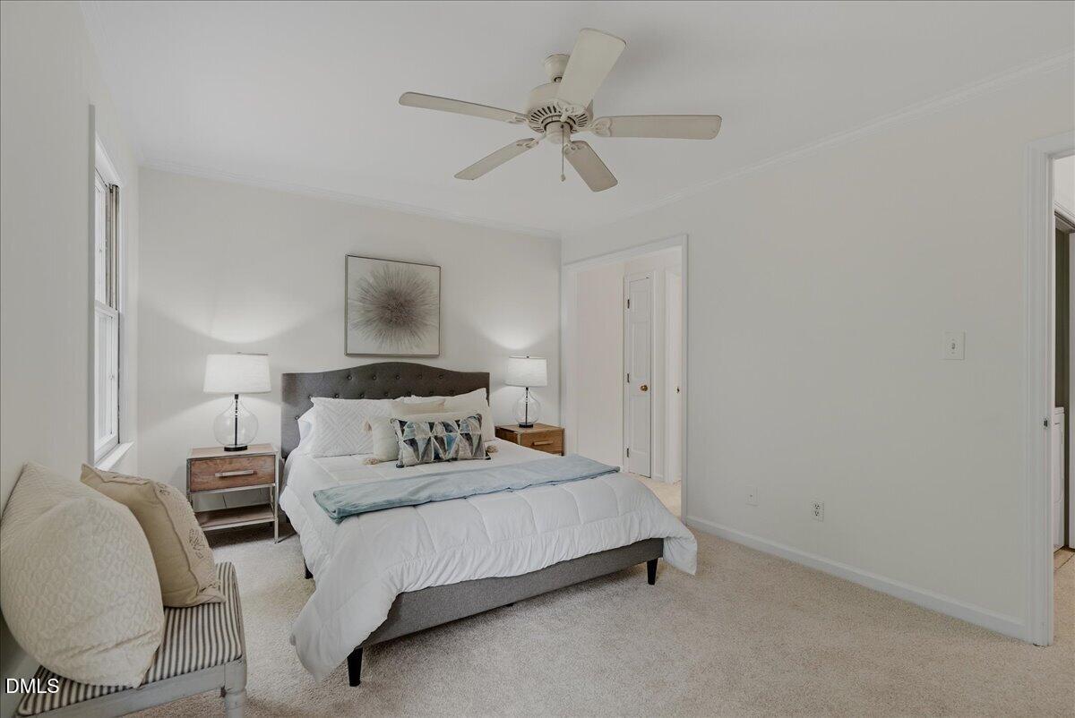2834 Wayland Drive Raleigh, NC 27608 - Photo 14 of 26 a bedroom with a bed and window