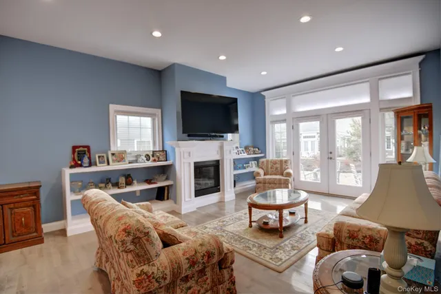a view of a dining area with furniture window and wooden floor