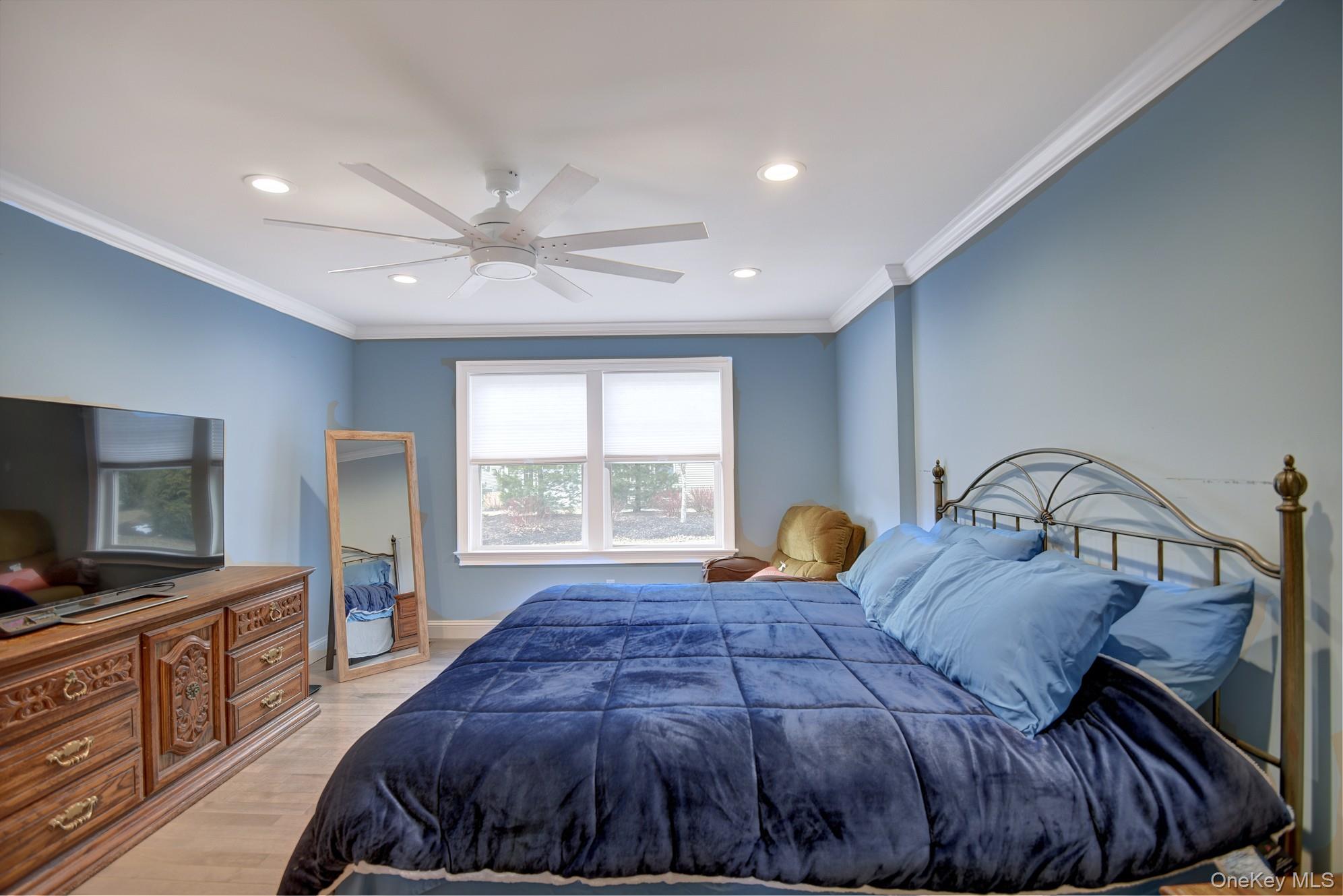 2 Spruce Place Bohemia, NY 11716 - Photo 14 of 34 a bedroom with furniture and a window