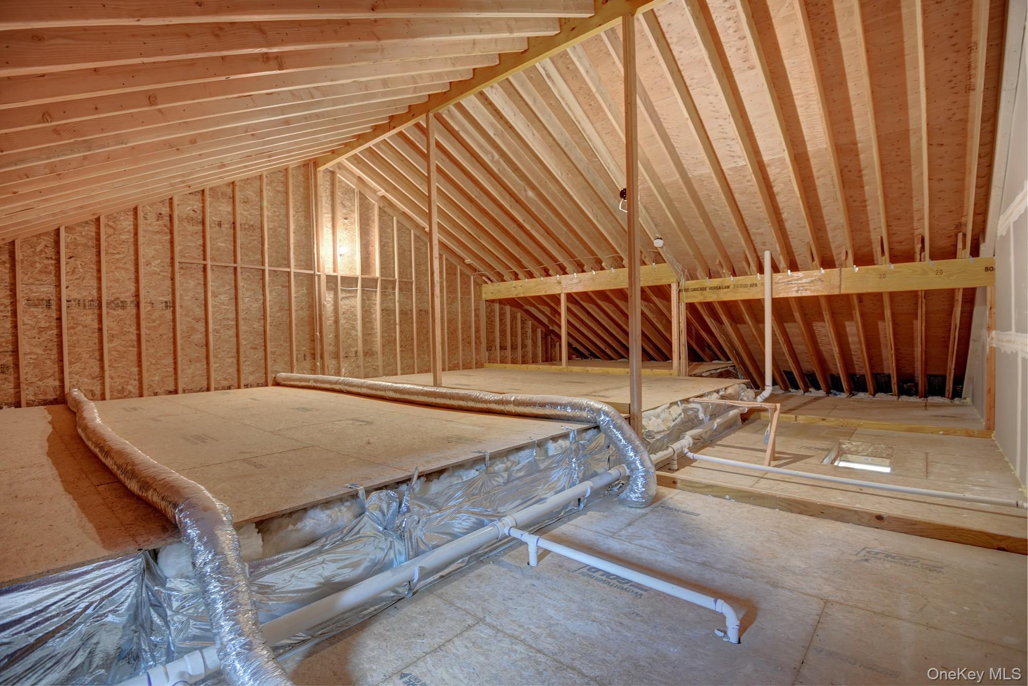 2 Spruce Place Bohemia, NY 11716 - Photo 22 of 34 a view of a backyard with a table and chairs