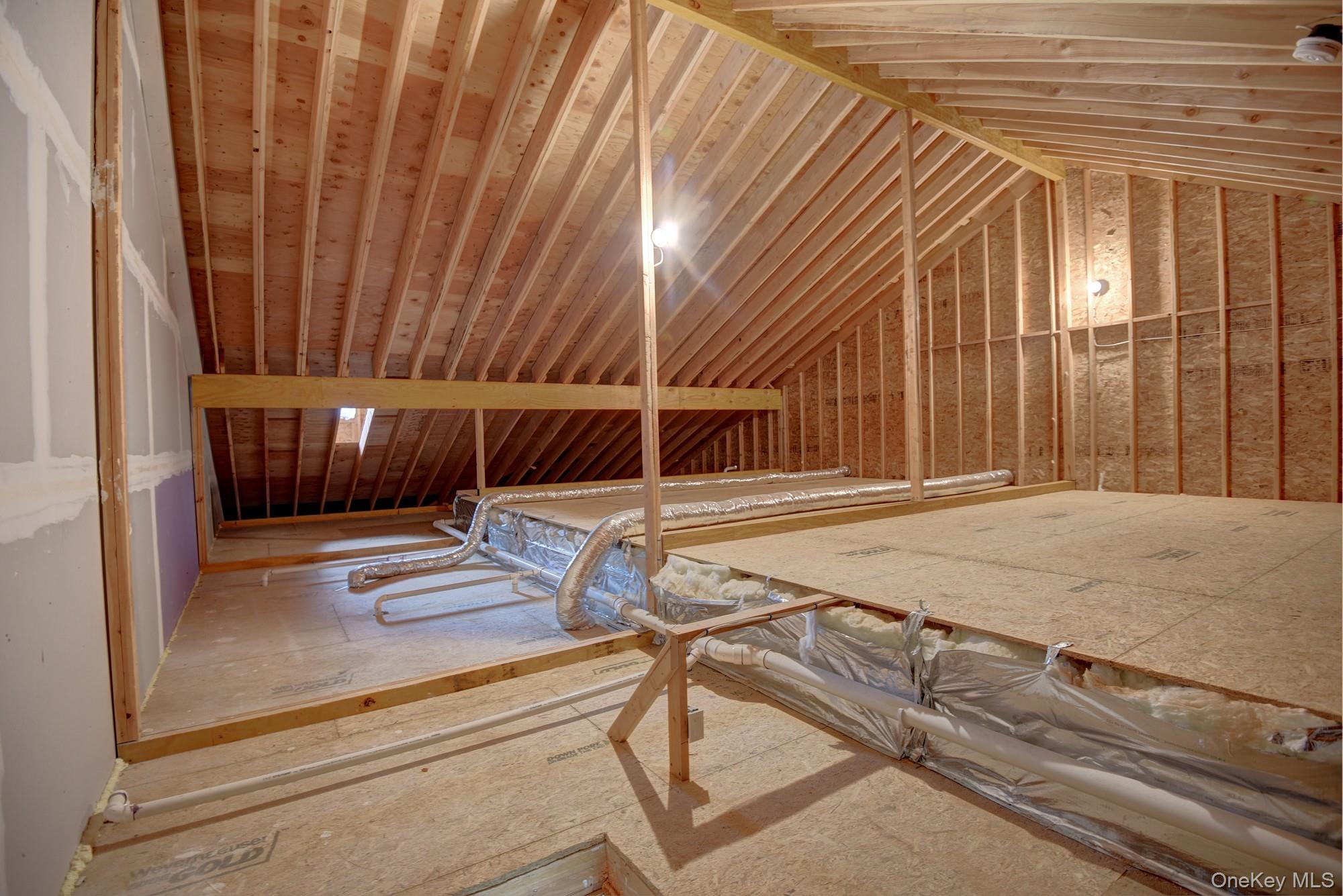 2 Spruce Place Bohemia, NY 11716 - Photo 23 of 34 a view of a room with stairs and a rug