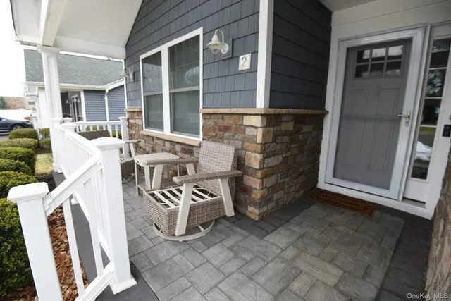 a front view of house with yard outdoor seating and barbeque oven