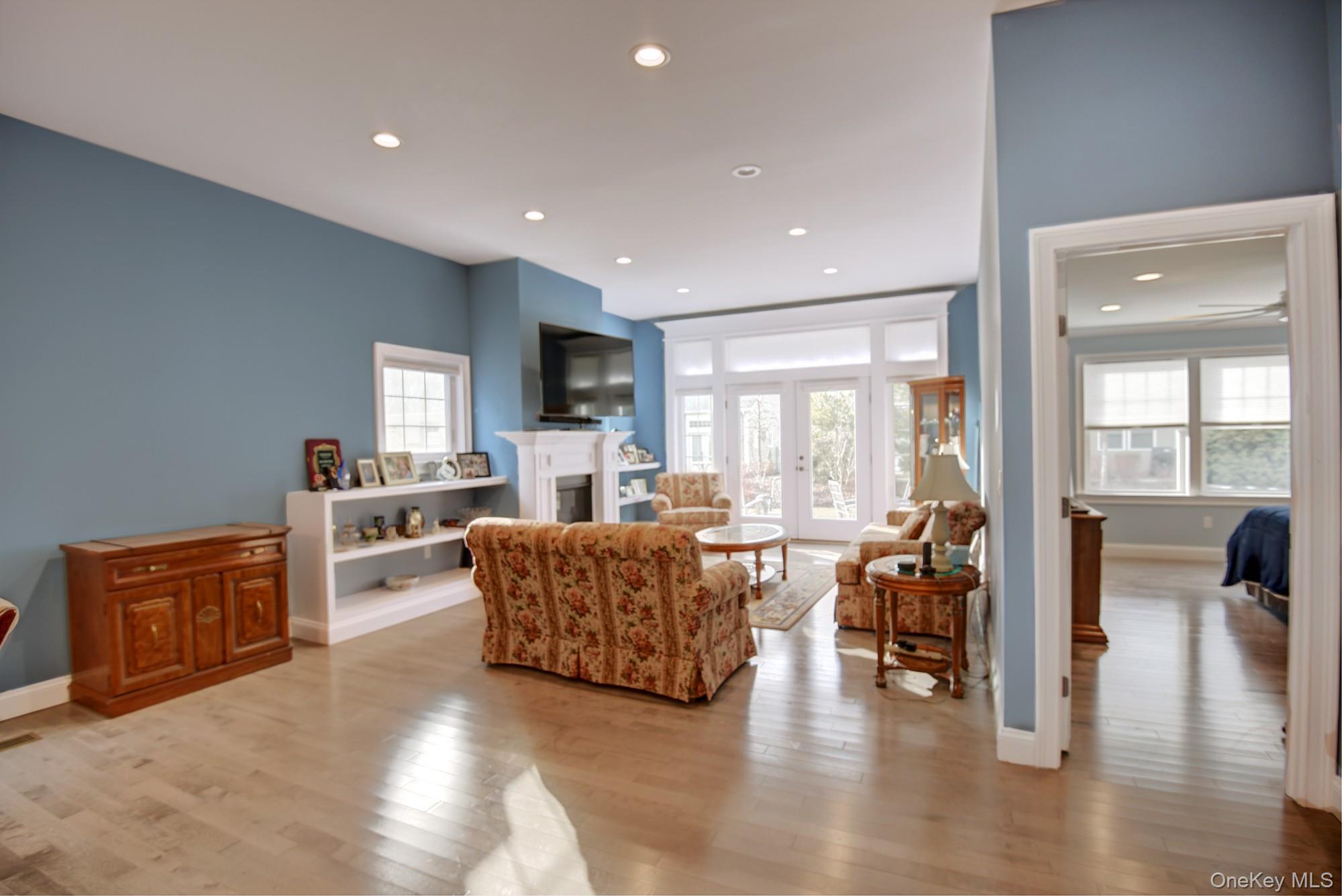 2 Spruce Place Bohemia, NY 11716 - Photo 8 of 34 a living room with furniture and a large window