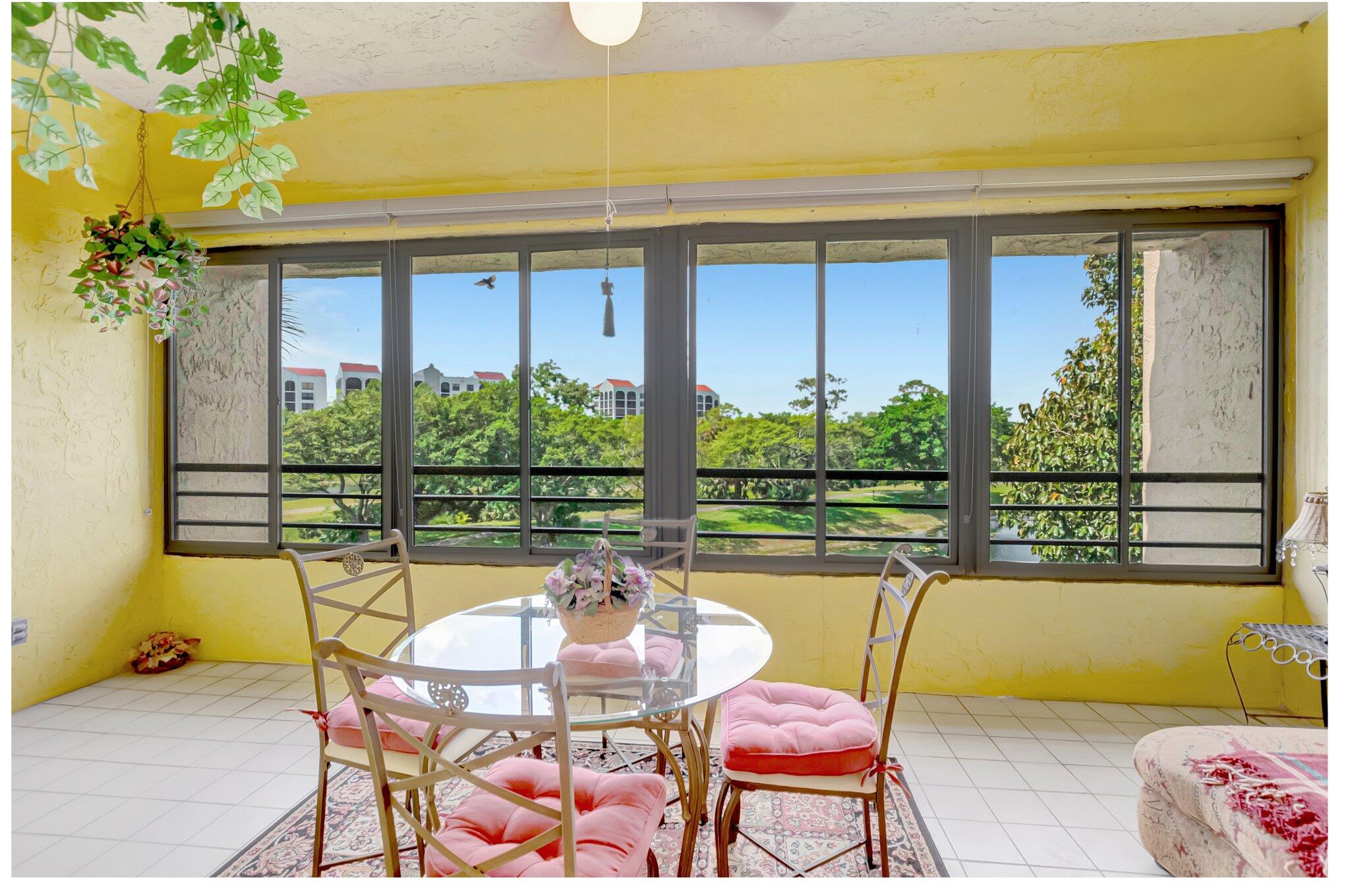 7472 La Paz Boulevard, Unit 302 Boca Raton, FL 33433 - Photo 14 of 36 Glassed in patio