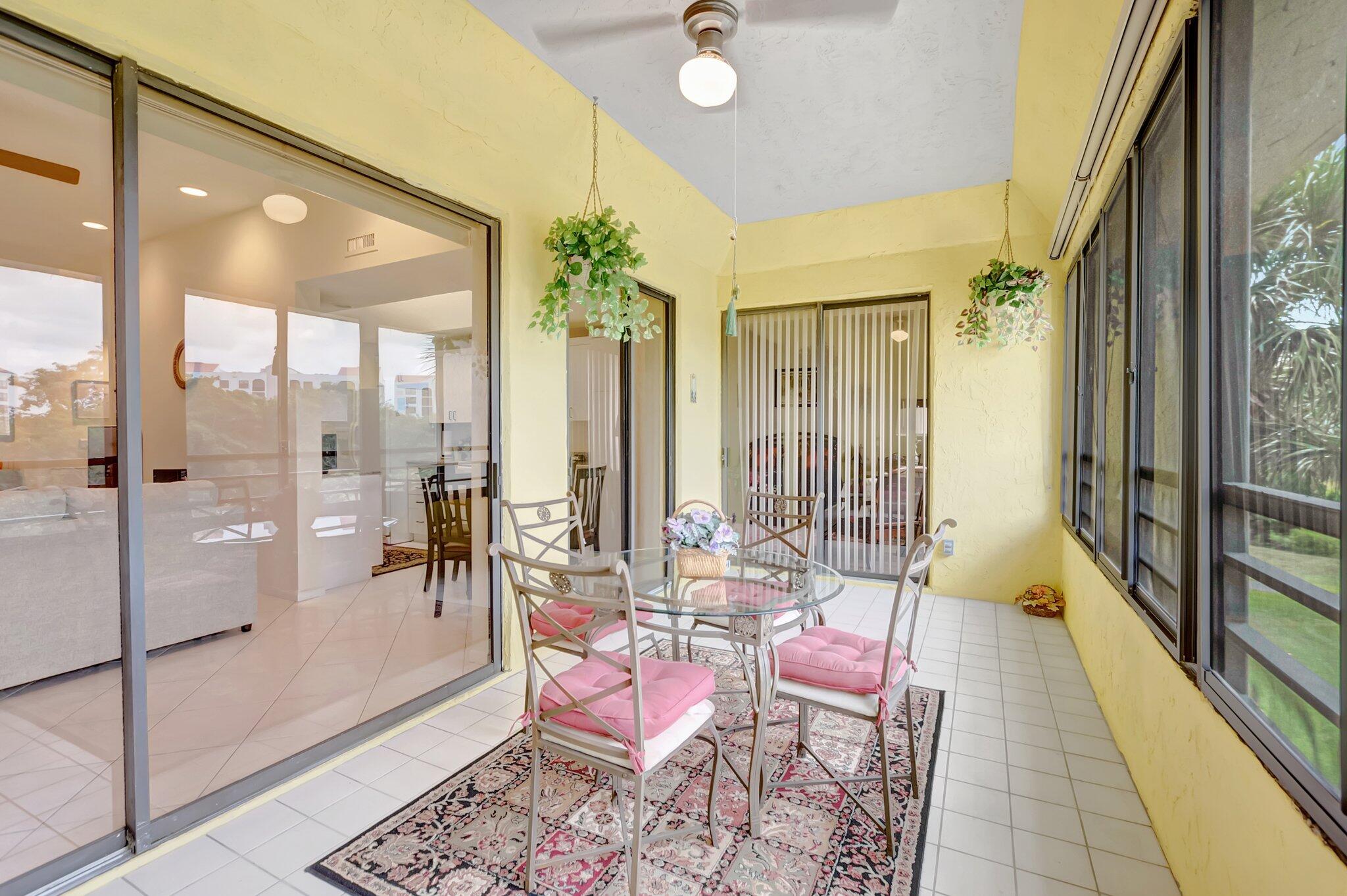 7472 La Paz Boulevard, Unit 302 Boca Raton, FL 33433 - Photo 15 of 36 Glassed in patio