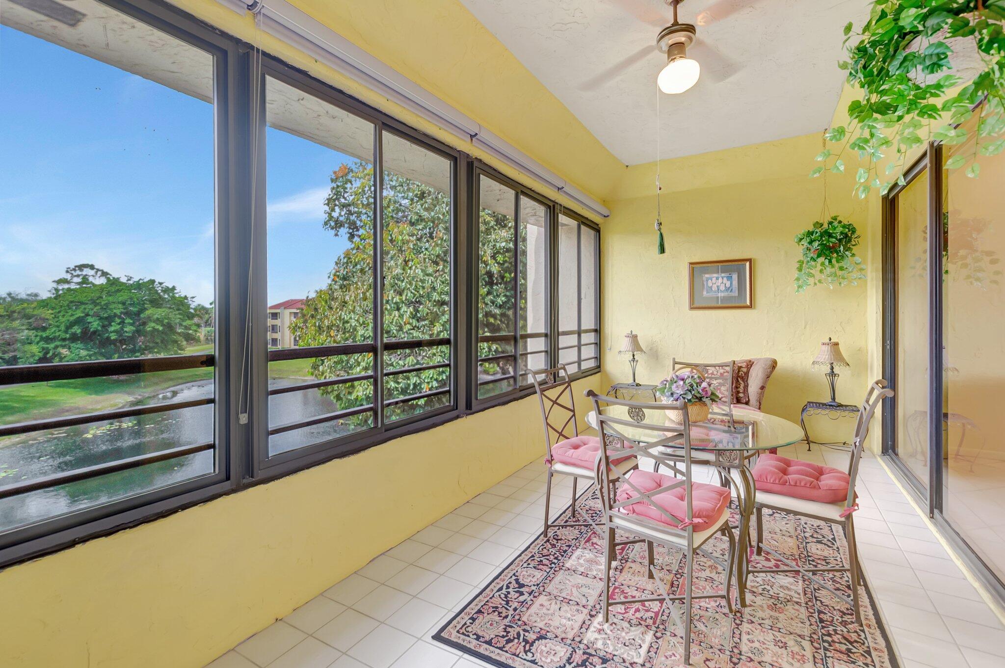 7472 La Paz Boulevard, Unit 302 Boca Raton, FL 33433 - Photo 16 of 36 Glassed in patio
