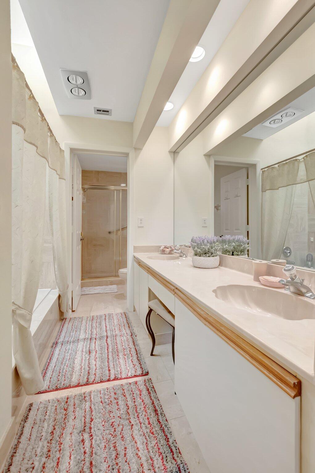 7472 La Paz Boulevard, Unit 302 Boca Raton, FL 33433 - Photo 22 of 36 Master bath