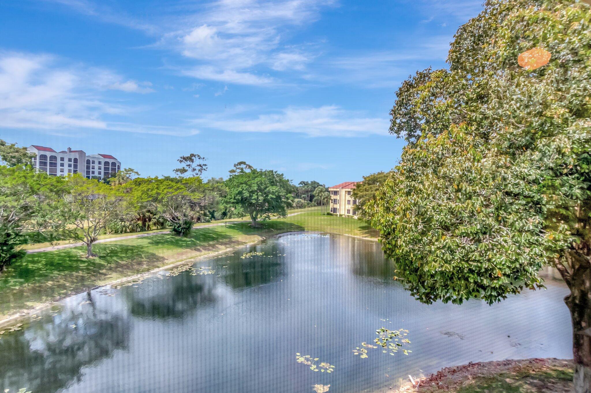 7472 La Paz Boulevard, Unit 302 Boca Raton, FL 33433 - Photo 31 of 36 View from patio