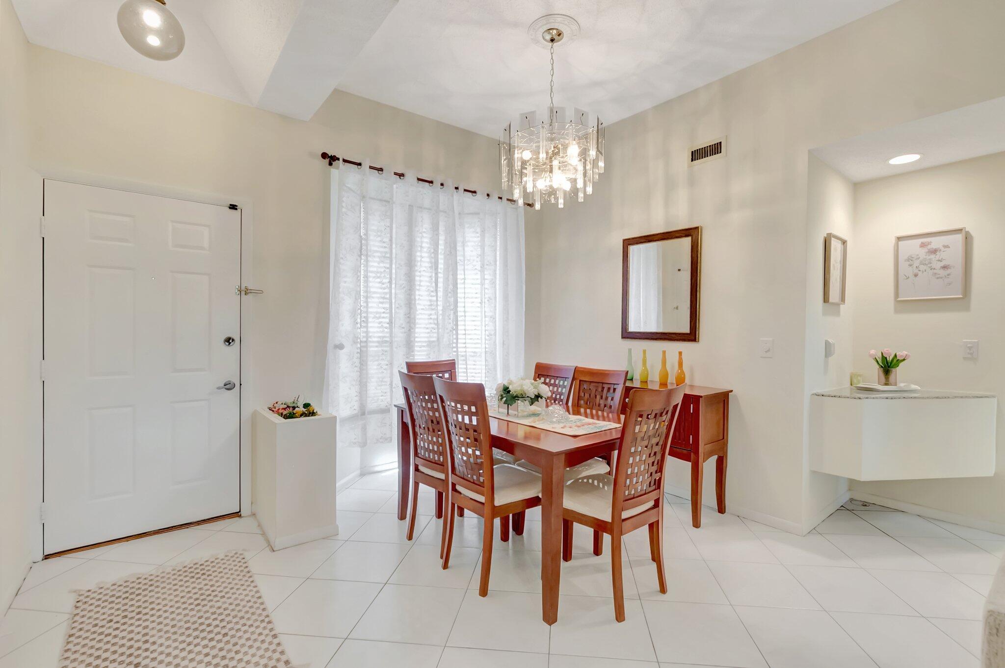 7472 La Paz Boulevard, Unit 302 Boca Raton, FL 33433 - Photo 8 of 36 dining room