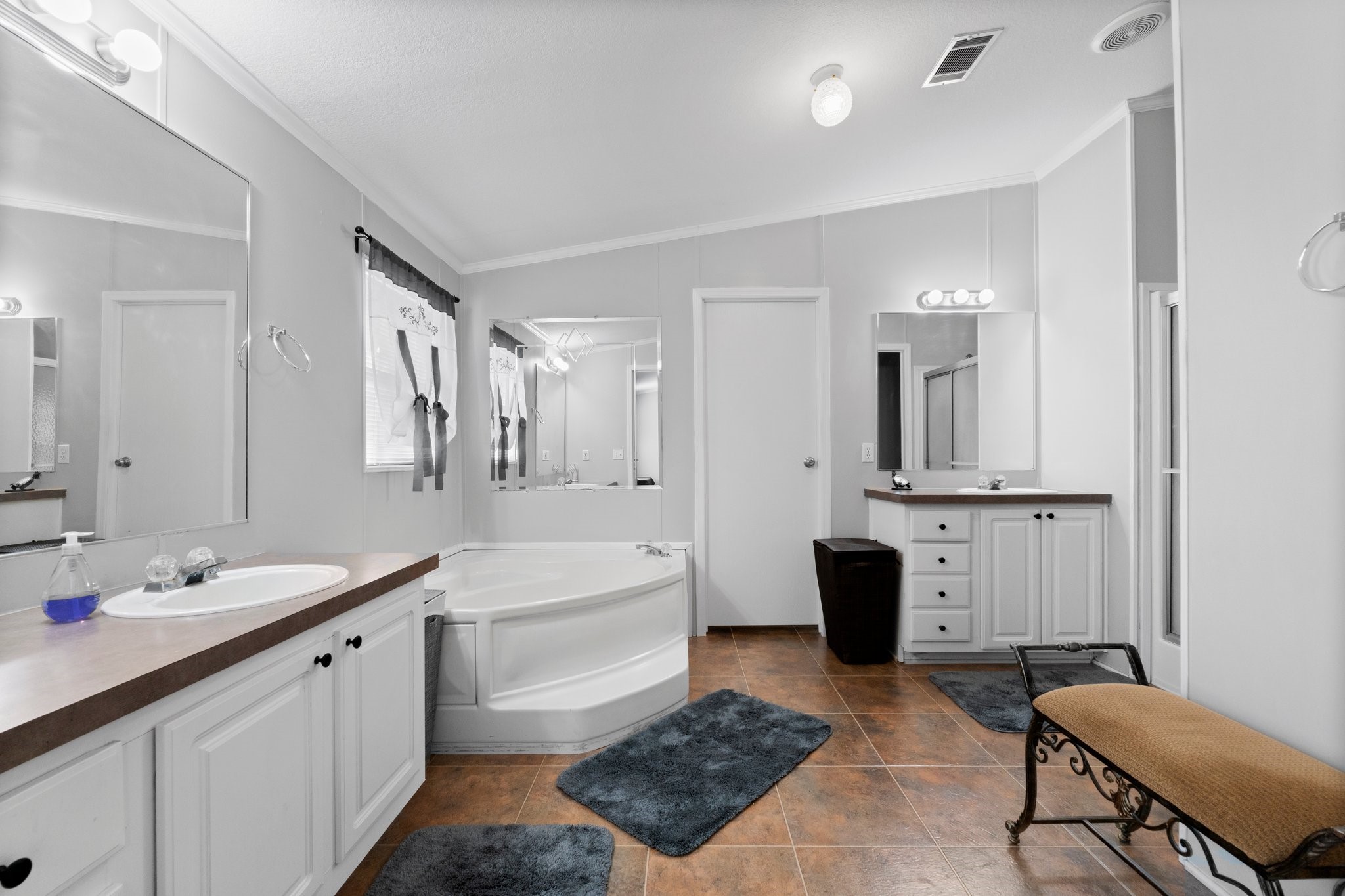 7105 Mt Zion Road New Waverly, TX 77358 - Photo 27 of 42 There's room to dance in this primary bathroom!