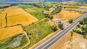 19 East Southfield Road Spanish Fork, UT 84660 - Photo 21 of 74 Aerial view of sparsely populated area featuring extensive farmland