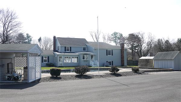 5 Rowell Road Danvers, MA 01923 - Photo 11 of 26 a view of a street with a building in the background