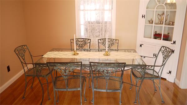 5 Rowell Road Danvers, MA 01923 - Photo 14 of 26 a view of a dining room with furniture and wooden floor