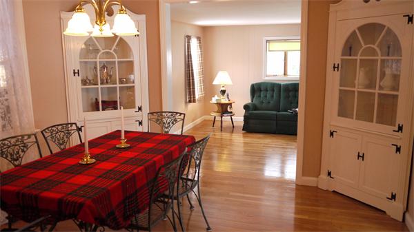 5 Rowell Road Danvers, MA 01923 - Photo 15 of 26 a view of a dining room with furniture and wooden floor