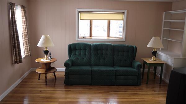 5 Rowell Road Danvers, MA 01923 - Photo 16 of 26 a living room with furniture and a window