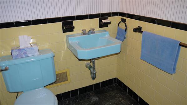 5 Rowell Road Danvers, MA 01923 - Photo 18 of 26 a bathroom with a toilet sink and mirror