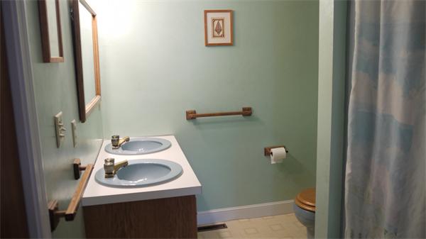 5 Rowell Road Danvers, MA 01923 - Photo 22 of 26 a bathroom with a sink and a toilet