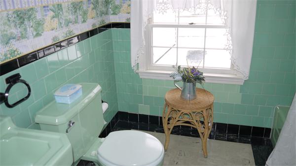 5 Rowell Road Danvers, MA 01923 - Photo 23 of 26 a bathroom with a sink mirror toilet and a window