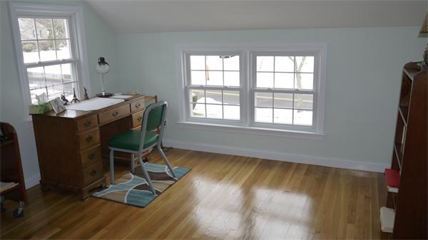 5 Rowell Road Danvers, MA 01923 - Photo 26 of 26 a dining room with wooden floor and a window