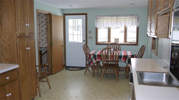 5 Rowell Road Danvers, MA 01923 - Photo 4 of 26 a view of a dining room with furniture and window