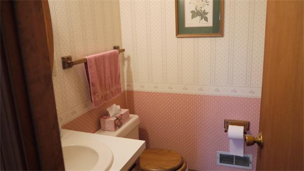 5 Rowell Road Danvers, MA 01923 - Photo 7 of 26 a bathroom with a toilet and sink
