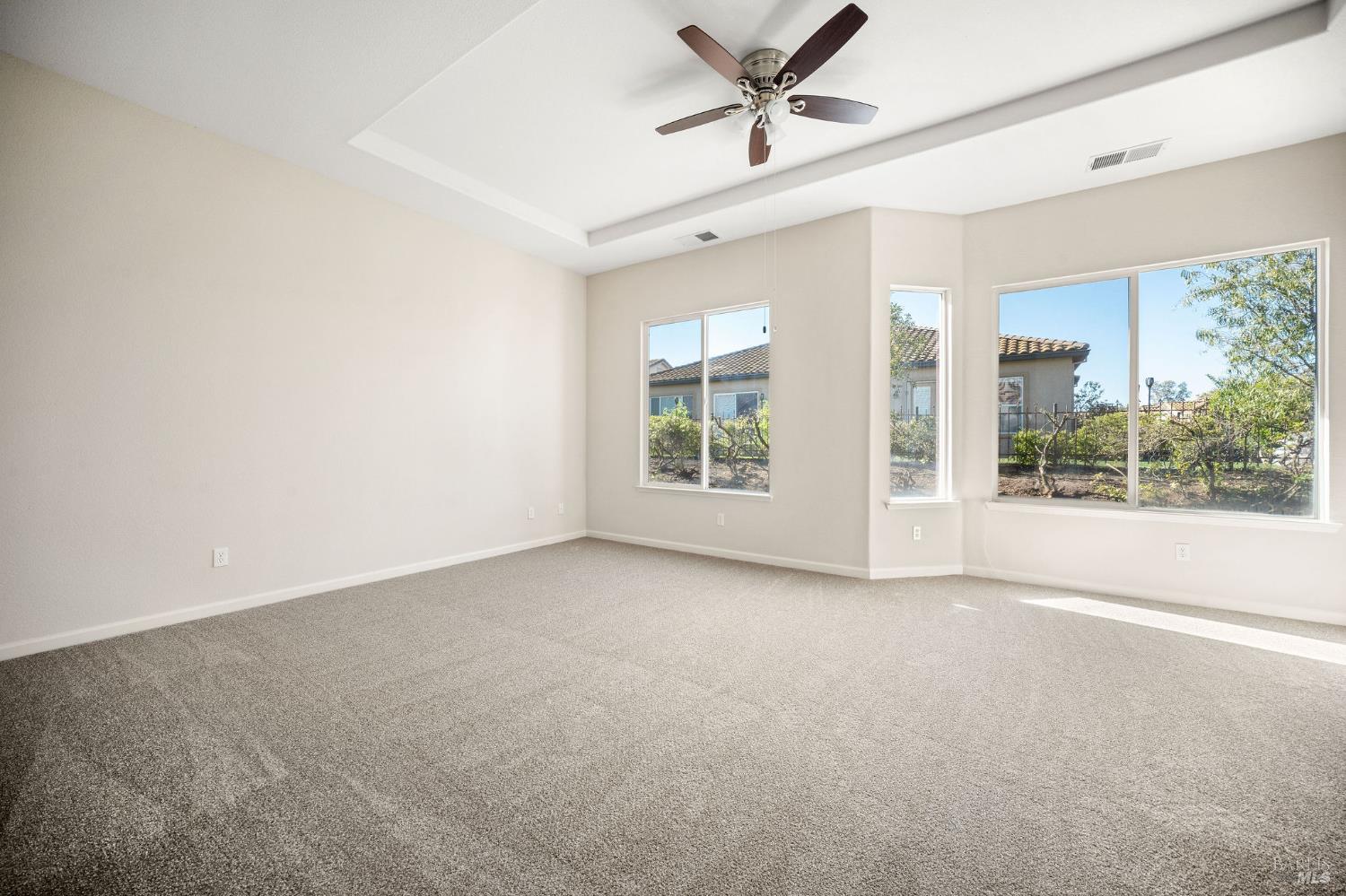 377 Shadow Creek Drive Rio Vista, CA 94571 - Photo 17 of 77 primary bedroom with ceiling fan and new carpet