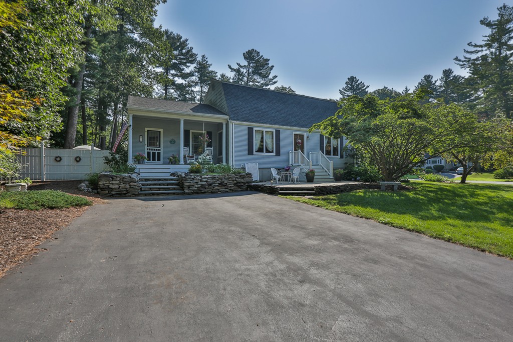 14 Belmont Road Billerica, MA 01821 - Photo 1 of 30 a front view of a house with a yard and garage