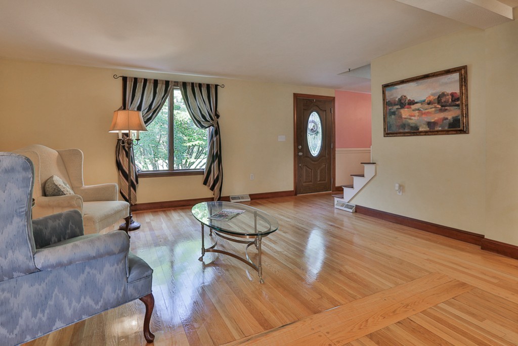 14 Belmont Road Billerica, MA 01821 - Photo 11 of 30 a living room with furniture and a window
