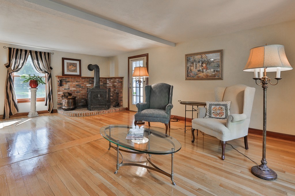 14 Belmont Road Billerica, MA 01821 - Photo 12 of 30 a living room with furniture and a wooden floor