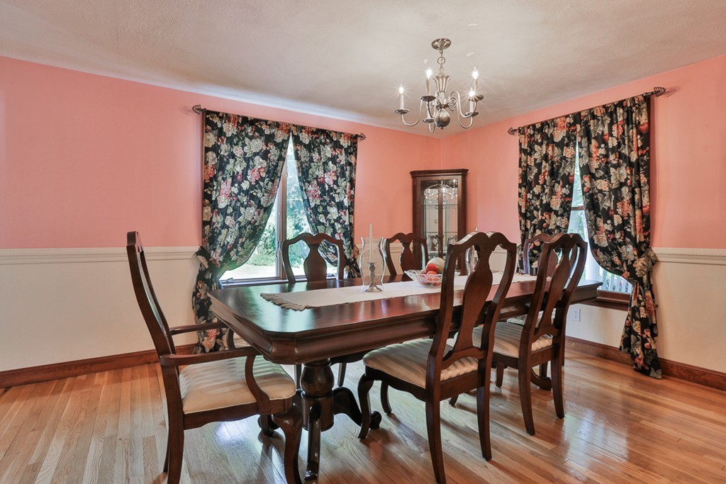 14 Belmont Road Billerica, MA 01821 - Photo 14 of 30 a view of a dining room with furniture and chandelier