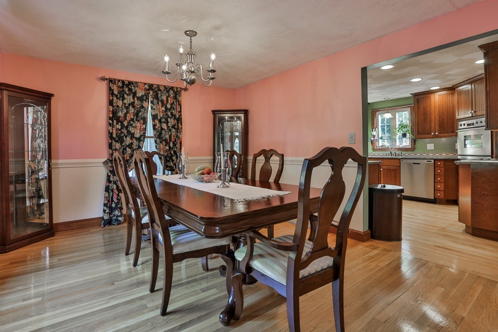 14 Belmont Road Billerica, MA 01821 - Photo 15 of 30 a view of a dining room with furniture and wooden floor