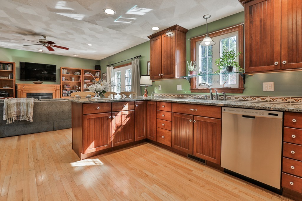 14 Belmont Road Billerica, MA 01821 - Photo 17 of 30 a kitchen with lots of counter top space and wooden floor