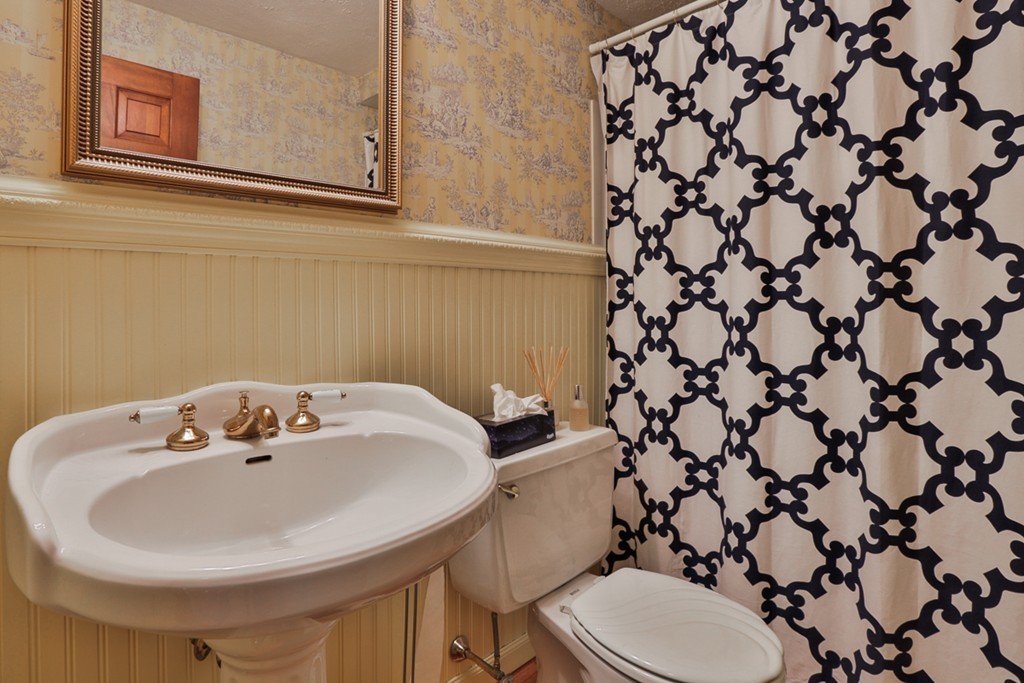 14 Belmont Road Billerica, MA 01821 - Photo 24 of 30 a bathroom with a sink and a mirror