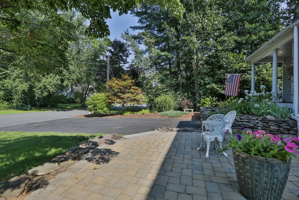 14 Belmont Road Billerica, MA 01821 - Photo 4 of 30 a view of a backyard with sitting area