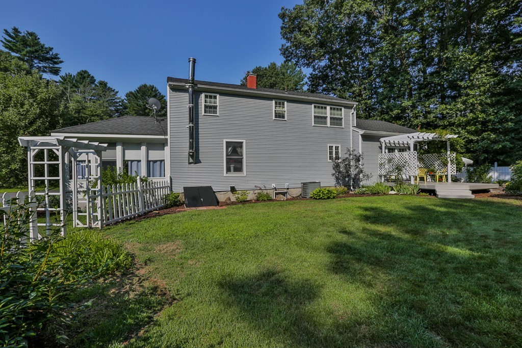 14 Belmont Road Billerica, MA 01821 - Photo 6 of 30 a front view of house with yard and green space