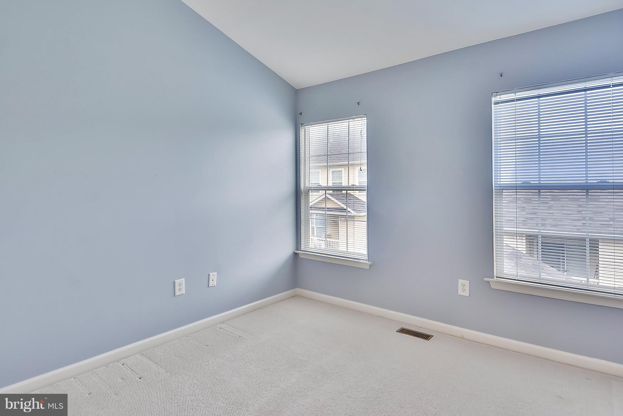 11357 King George Drive, Unit 10 Wheaton, MD 20902 - Photo 19 of 30 an empty room with a window