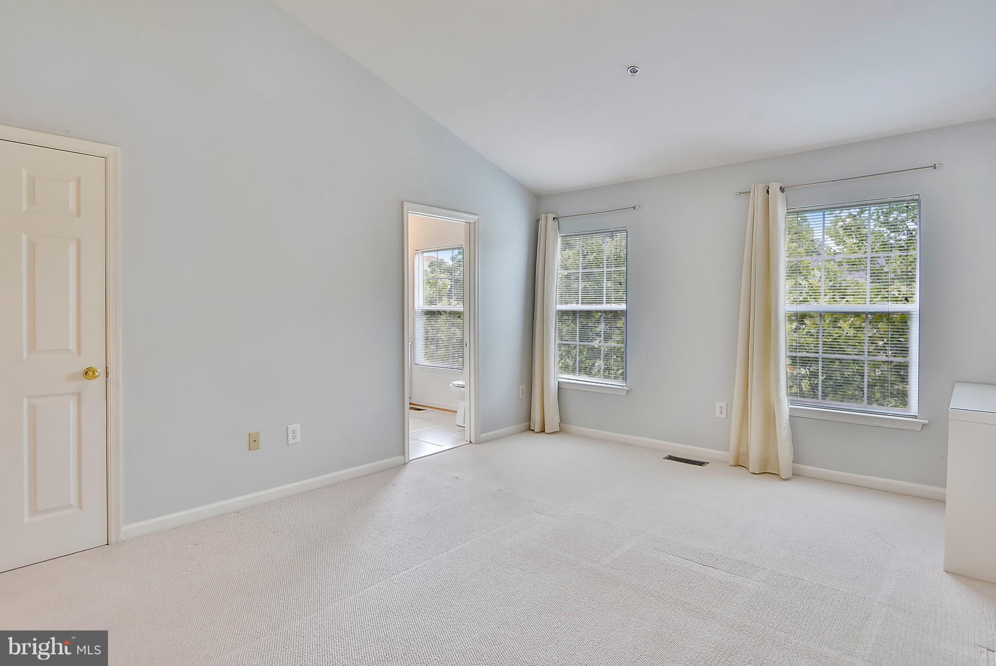 11357 King George Drive, Unit 10 Wheaton, MD 20902 - Photo 24 of 30 a view of an empty room with a window