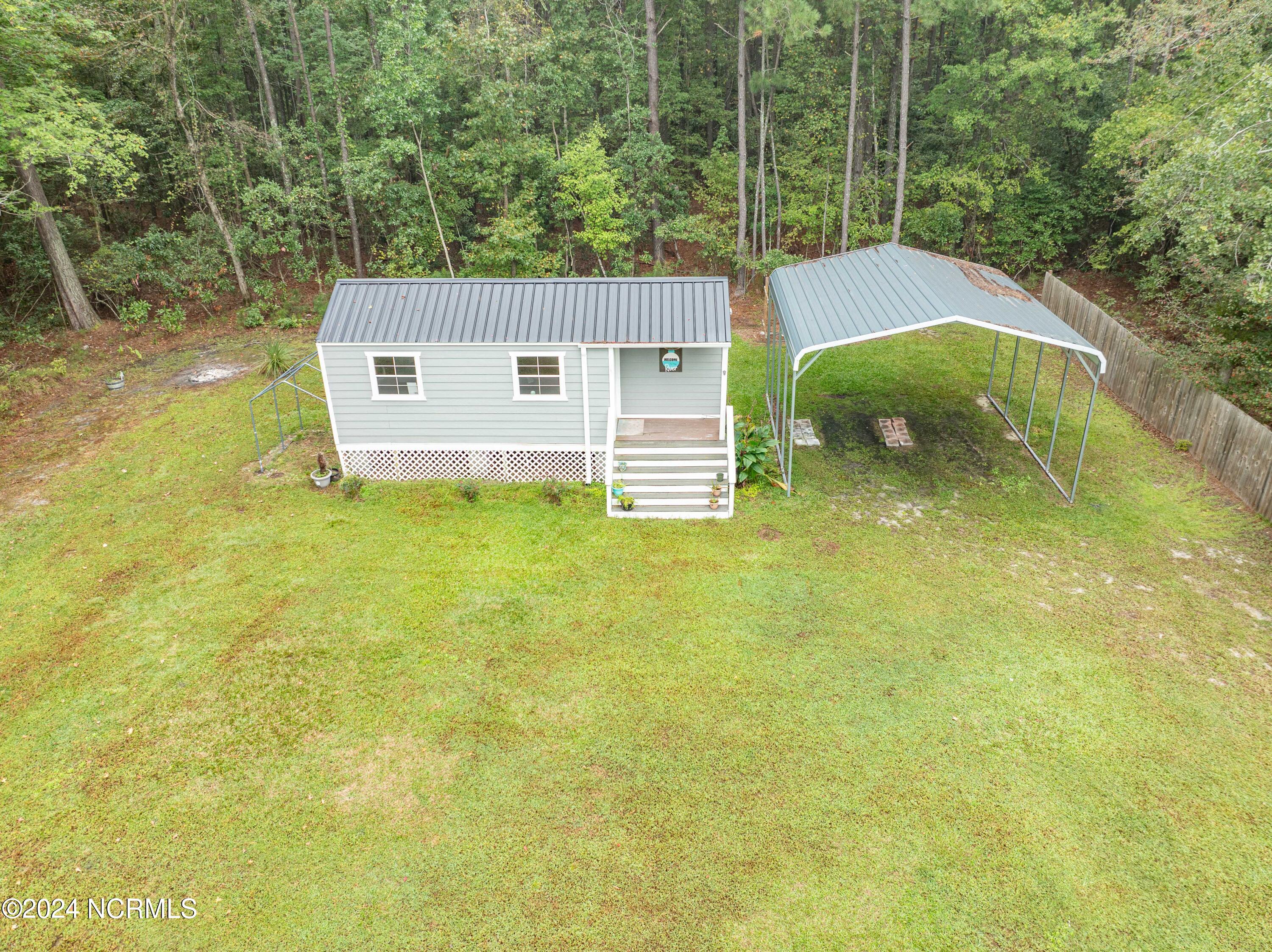 352 Duck Creek Road Washington, NC 27889 - Photo 32 of 34 Back She Shed and Boat/Camper shelter