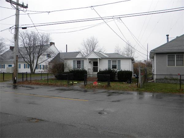 55 Newport Road Hull, MA 02045 - Photo 3 of 3 a front view of a house with a yard