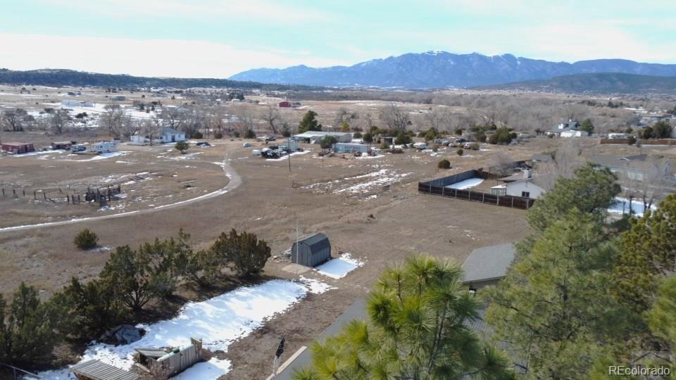 3279 County Rd CC252 Colorado City, CO 81019 - Photo 20 of 22 a view of a town with mountains in the background