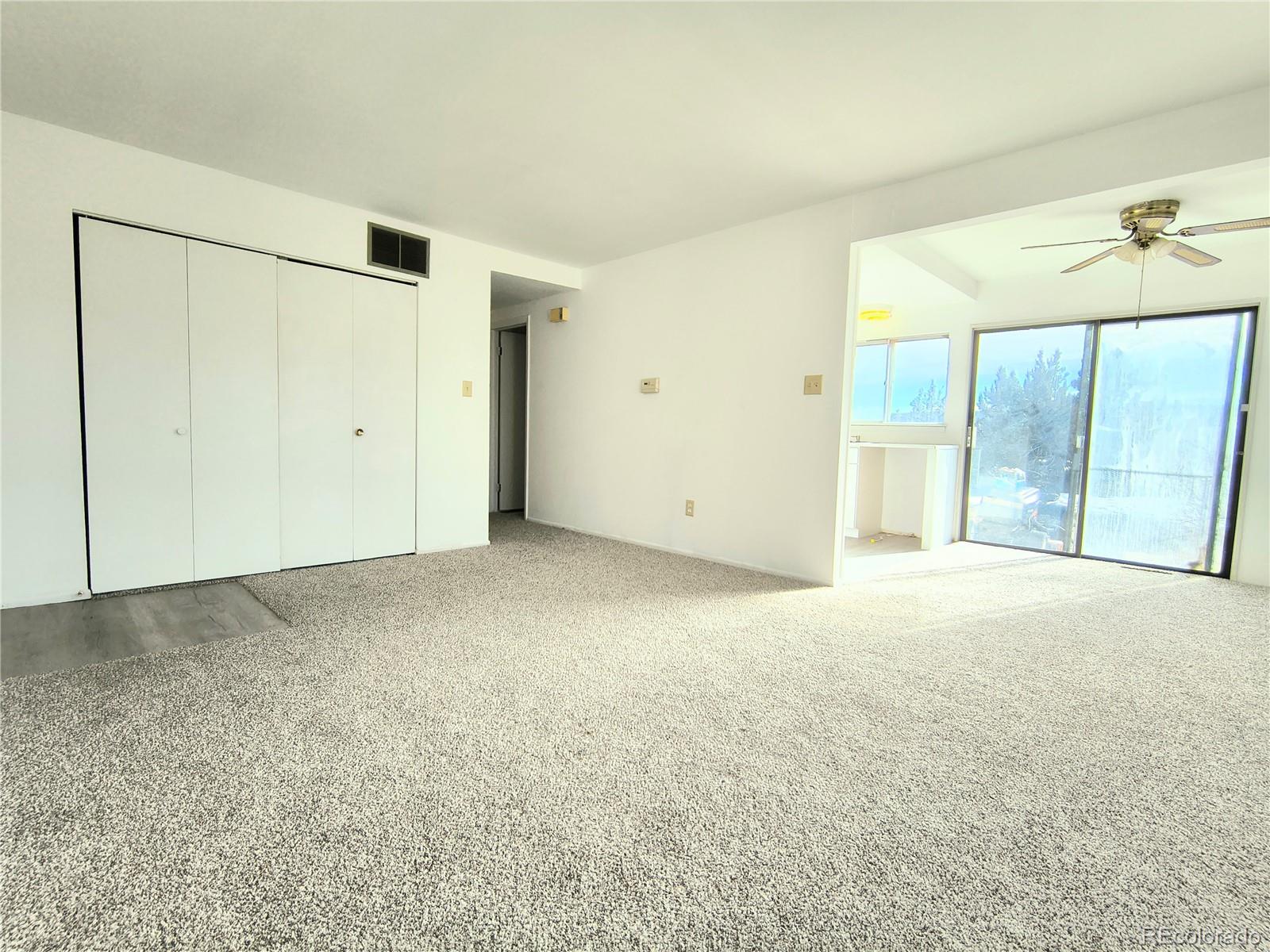 3279 County Rd CC252 Colorado City, CO 81019 - Photo 3 of 22 a view of an empty room with a window
