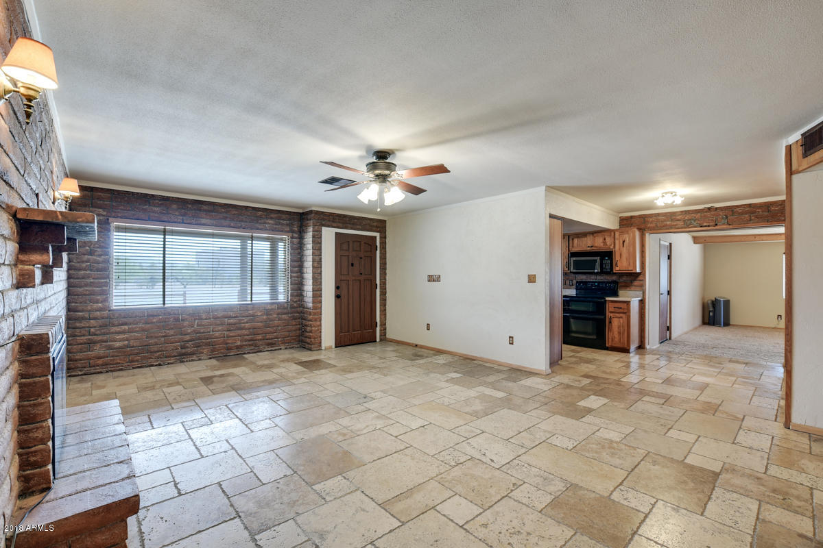 1002 East Maddock Road Phoenix, AZ 85086 - Photo 8 of 49 Living room-to dining area