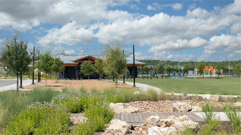 167 Jeffers Kyle, TX 78640 - Photo 28 of 40 a view of a garden and basketball court