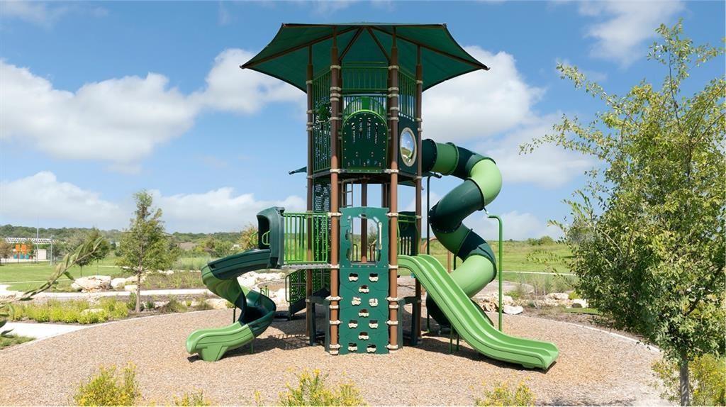 167 Jeffers Kyle, TX 78640 - Photo 29 of 40 a view of a swimming pool in the backyard of a house