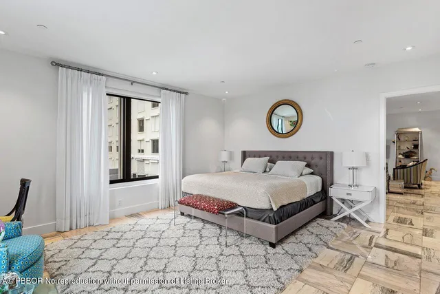 a bathroom with a shower sink vanity and mirror